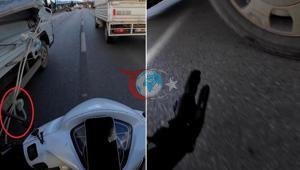 Seyir halinde, kamyonetten sarkan ipe dolanan motosikletli dehşeti yaşadı