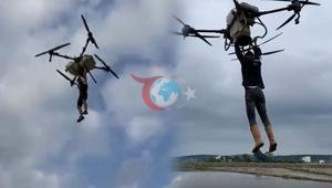 Çeltik tarlasında akılalmaz anlar Tutunduğu dronla havalandı: Düşme anı kamerada