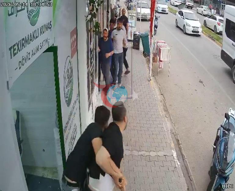 Hatayda valyutadəyişmə məntəqəsində ölümlə üz-üzə gəldi. Güllələrdən saniyələr içində qaçış kamerada