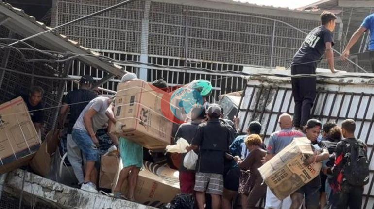 Venezuelada deprem sonrası skandal görüntü Yağma başladı: Polisler motosikletleriyle taşıdı