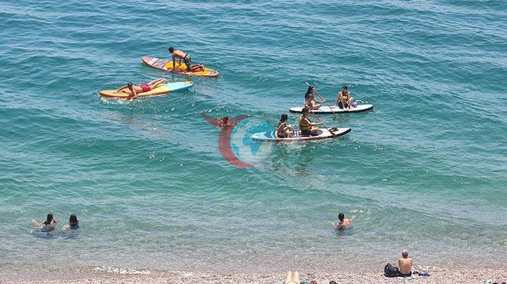 Antalya'da Sıcaklık 47 Dereceyi Aştı, Sahiller Dolup Taştı