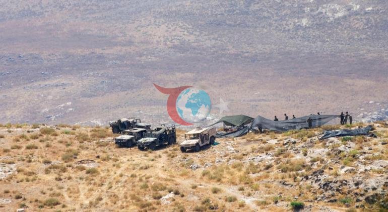 İsrailden Suriyeye topçu atışı Köy halkı yolları taşlarla kapattı