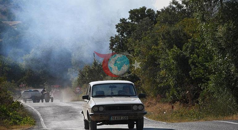 Balıkəsirdə baş verən meşə yanğınının 2-ci günündə Sındırgı-Simav yolu bağlandı