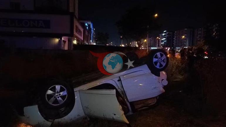 Bursada kontrolden çıkan otomobil araziye savrulup takla attı