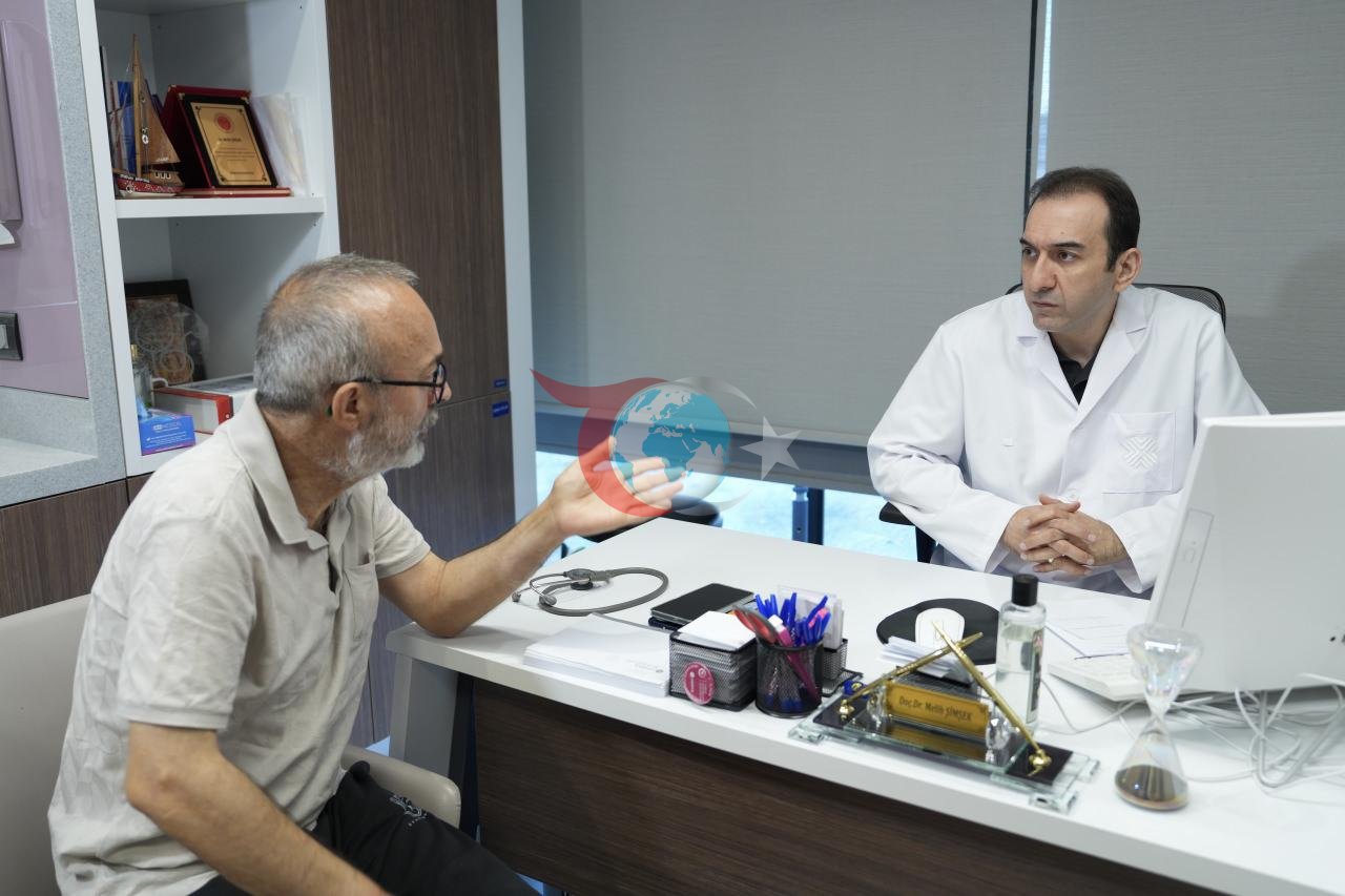 Erdem Tanrısevergil (56) ve Tıbbi Onkoloji Uzmanı Doç. Dr. Melih Şimşek